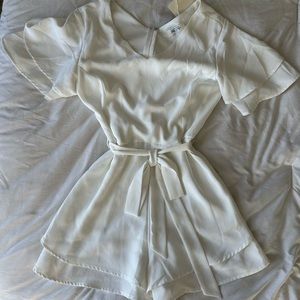 White romper with tags
